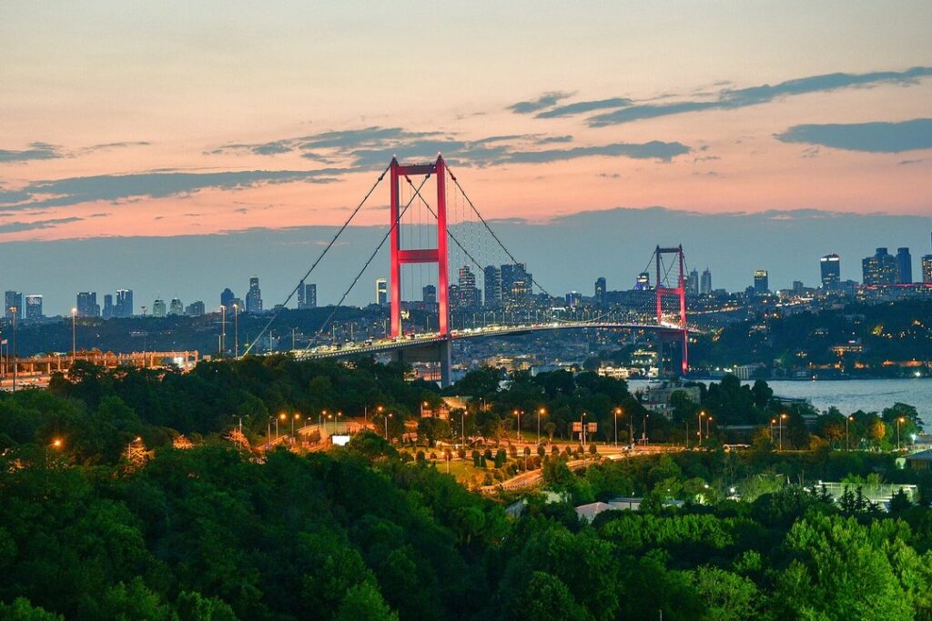 The Bosphorus Bridge in Istanbul at dusk connecting Europe and Asia